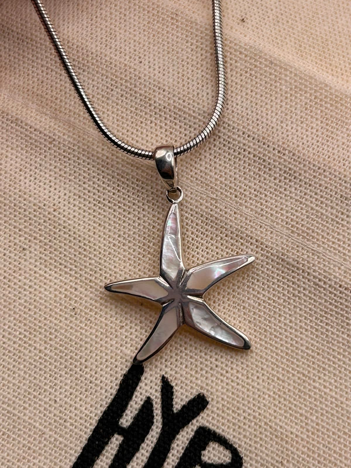 Pingente Estrela do Mar Madre Perola 2cm