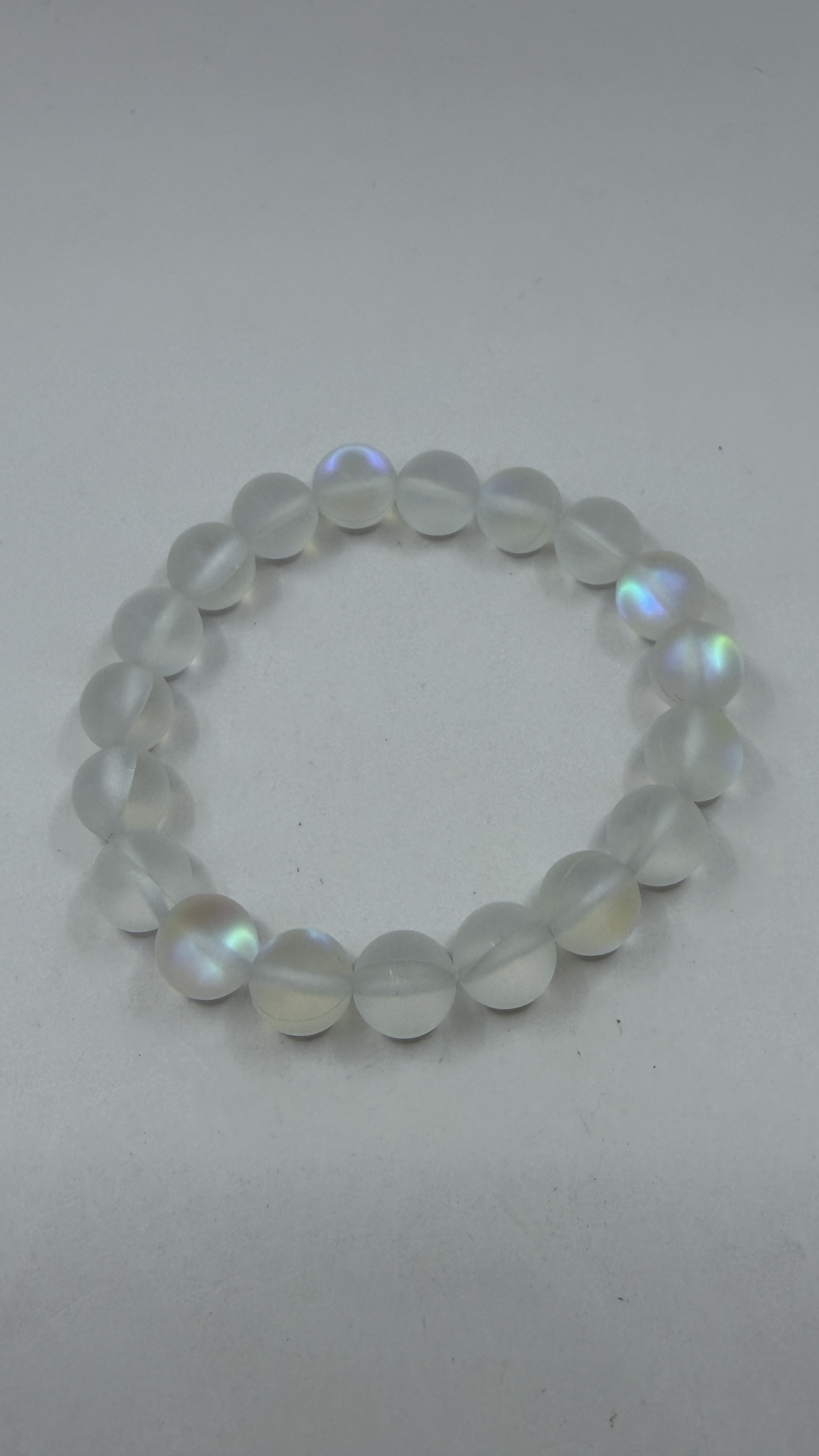 Pulseira  cristal aura com elástico de seda